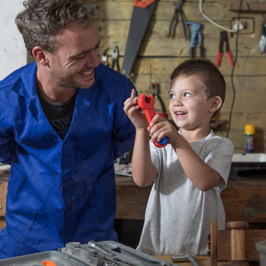 Father and Son working on a DIY project with their tools