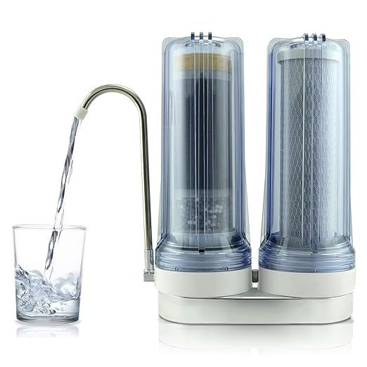 A glass of clear, filtered water from the APEX EXPRT MR-2050 water filter system.