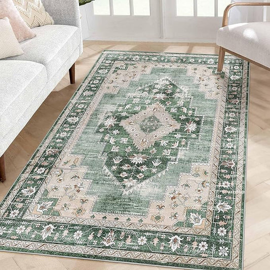 Green boho rug with a floral pattern in a bohemian-style living room with woven baskets and plants.