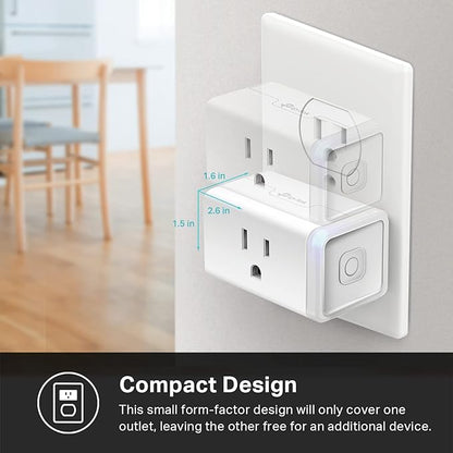 Kasa Smart Plug Mini discreetly plugged into a wall outlet, controlling a lamp.